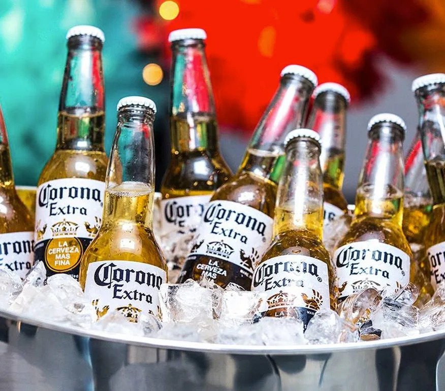 Corona sales soar as AB InBev beats expectations, sending its stock higher